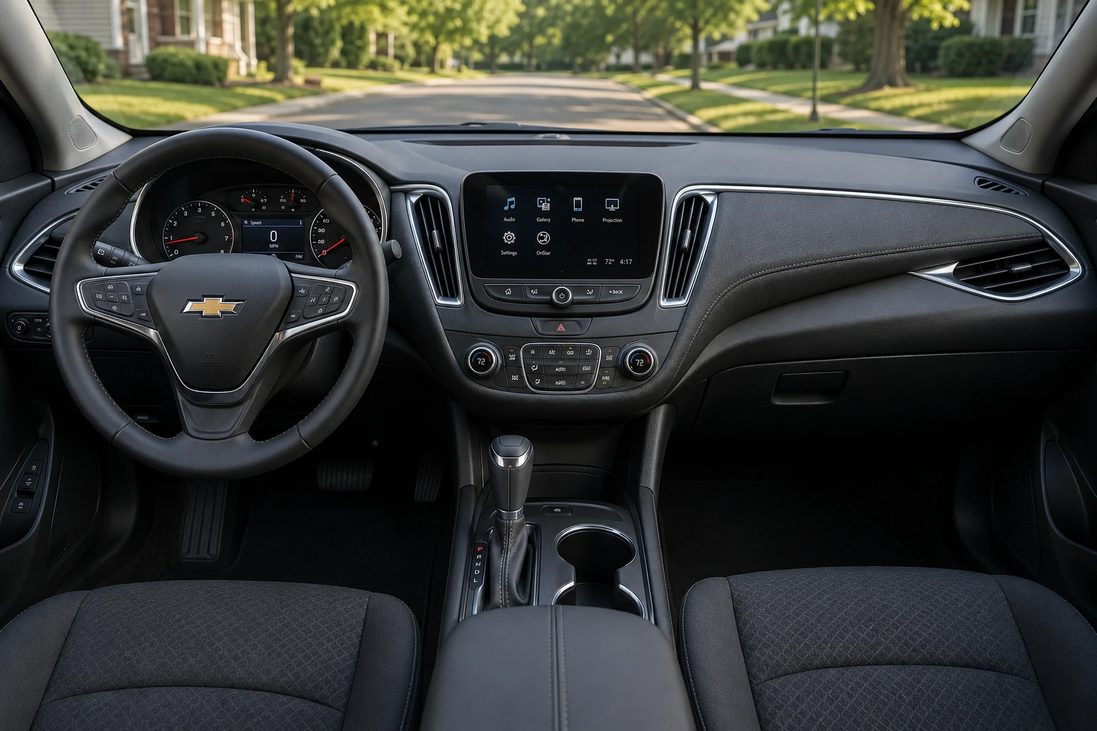The dashboard and touchscreen of a Chevrolet Malibu, lit by natural daylight.