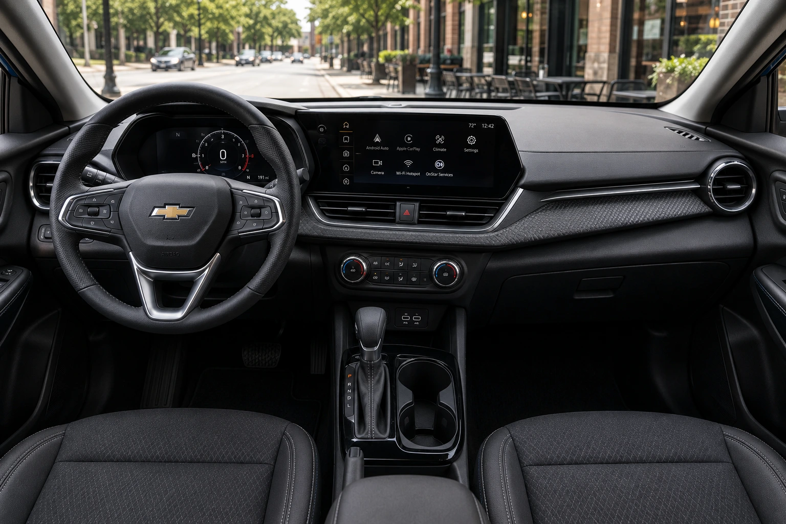 The dashboard and touchscreen of a Chevrolet Trax, lit by natural daylight.