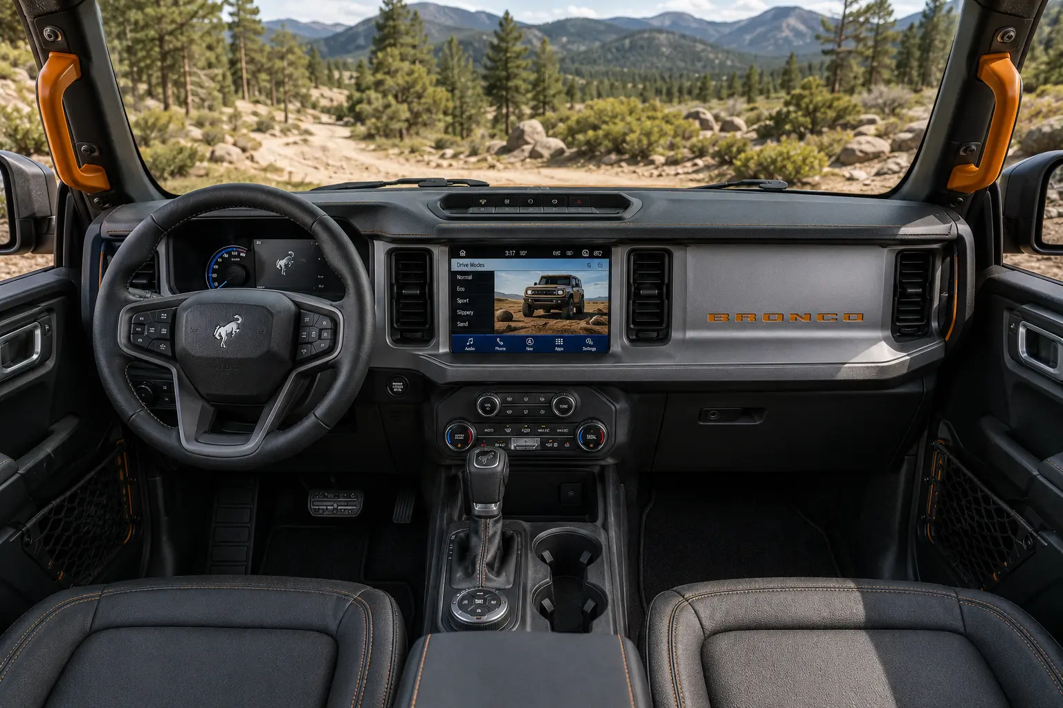 The rugged, grab-handle-equipped interior of a Ford Bronco, lit by natural daylight.