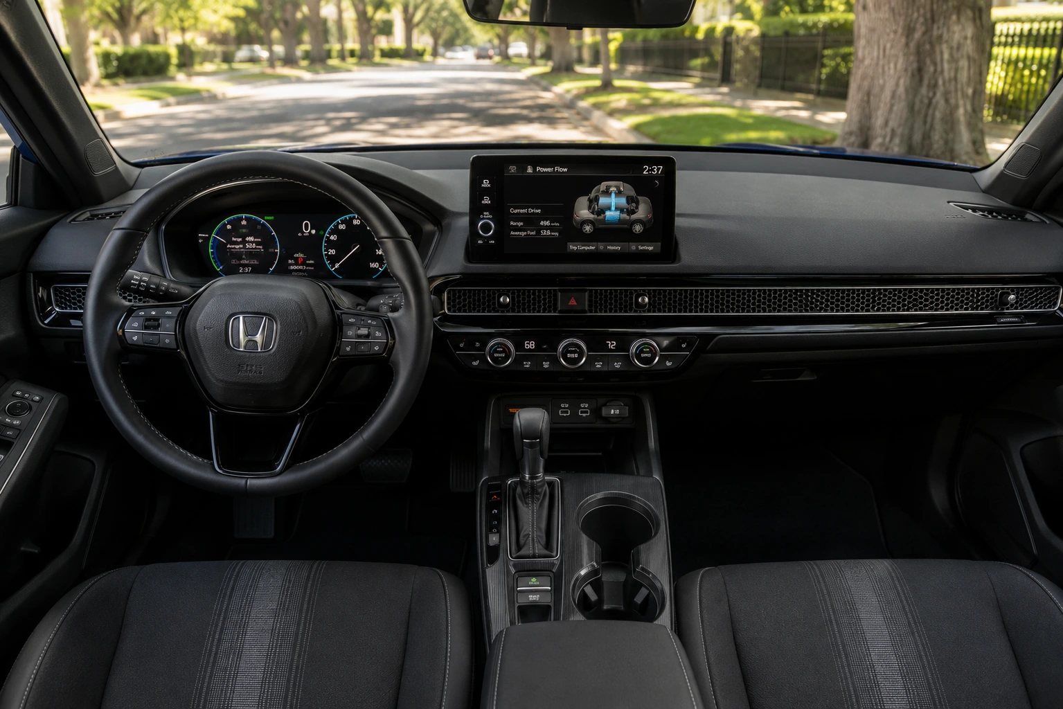 The dashboard and hybrid-system gauge display of a Honda Civic Hybrid, lit by natural daylight.