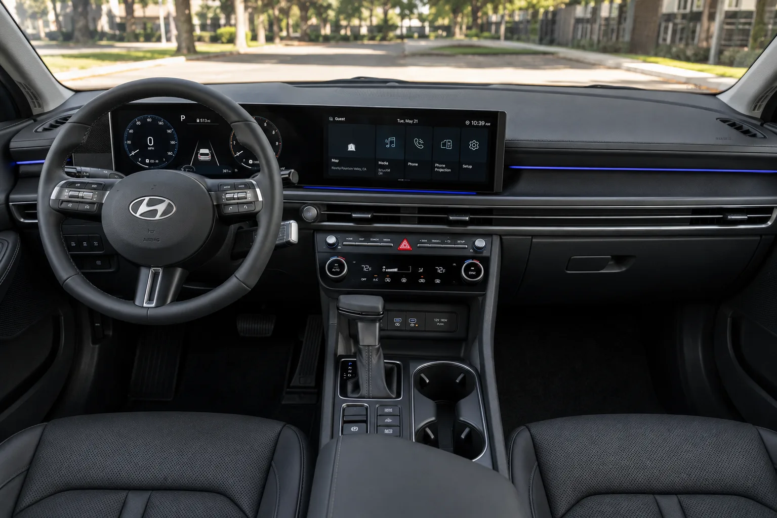 The dashboard and digital cluster of a Hyundai Sonata, lit by natural daylight.