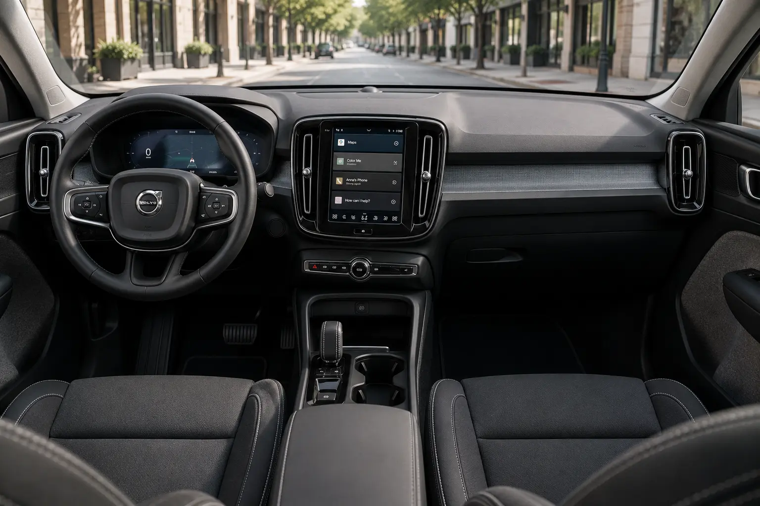 The Scandinavian-minimalist dashboard of a Volvo XC40, lit by natural daylight.